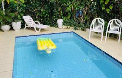 Imagem: A casa em condomínio possui 5 Dormitórios, 5 Banheiros, 4