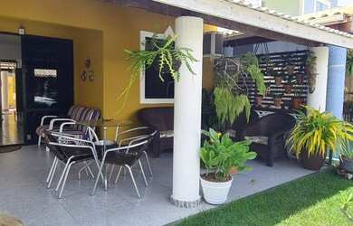 Imagem: A casa possui 2 Dormitórios, 2 Vagas na garagem e está localizado