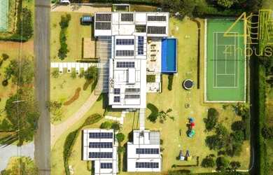 Imagem: A casa em condomínio possui 5 Dormitórios, 5 Banheiros, 5