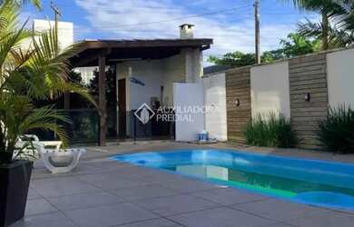 Imagem 6: Residência com 4 quartos, hidromassagem, churrasqueira e piscina