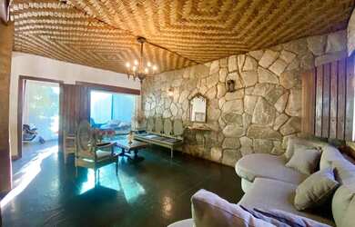 Imagem: A casa possui 4 Dormitórios, 5 Banheiros, 5 Vagas na garagem