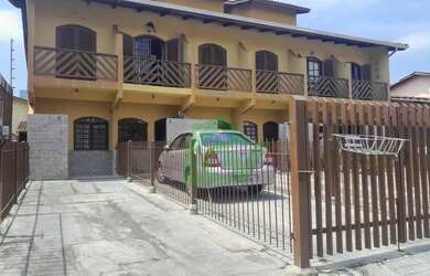 Imagem: A casa possui 2 Dormitórios, 3 Banheiros, 2 Vagas na garagem