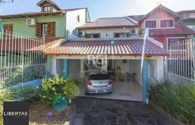 Imagem: A casa possui 3 Dormitórios, 4 Banheiros, 3 Vagas na garagem