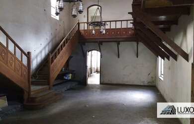 Imagem: A casa possui 3 Dormitórios, 5 Banheiros, 5 Vagas na garagem