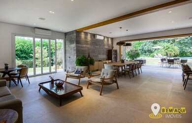 Imagem: A casa em condomínio possui 5 Dormitórios, 5 Banheiros, 4