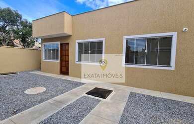 Imagem: A casa possui 3 Dormitórios, 2 Banheiros, 3 Vagas na garagem