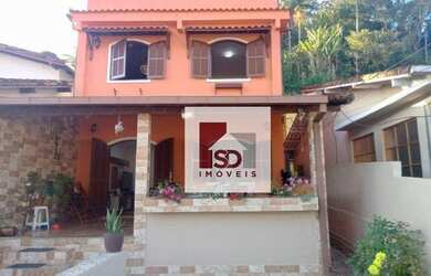 Imagem: A casa possui 3 Dormitórios, 3 Banheiros, 1 Vaga na garagem