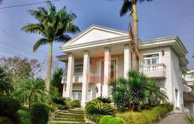 Imagem: A casa em condomínio possui 4 Dormitórios, 5 Banheiros, 5