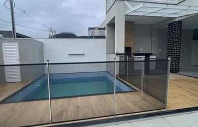 Imagem: A casa em condomínio para alugar possui 3 Dormitórios, 5 Banheiros