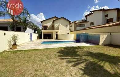 Imagem: A casa em condomínio possui 4 Dormitórios, 5 Banheiros, 5