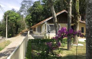 Imagem: A casa possui 1 Dormitório, 2 Banheiros, 2 Vagas na garagem