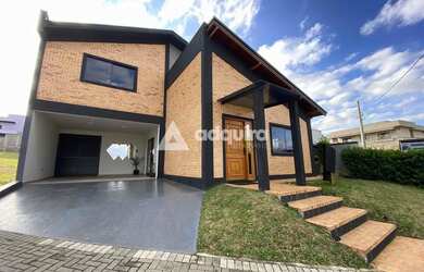 Imagem: A casa em condomínio possui 4 Dormitórios, 4 Banheiros, 2