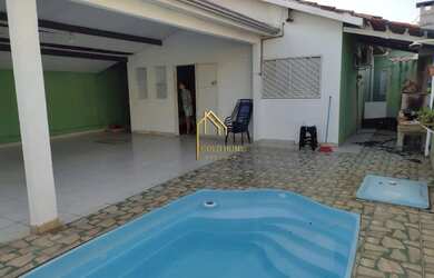 Imagem: A casa possui 3 Dormitórios, 3 Banheiros, 3 Vagas na garagem