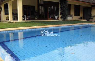 Imagem: A casa em condomínio possui 4 Dormitórios, 5 Banheiros, 5