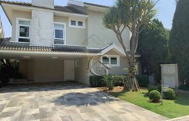 Imagem: A casa possui 5 Dormitórios, 5 Banheiros, 5 Vagas na garagem