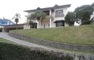 Imagem: A casa em condomínio possui 4 Dormitórios, 5 Banheiros, 3