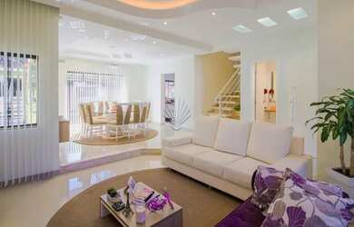 Imagem: A casa possui 3 Dormitórios, 4 Banheiros, 3 Vagas na garagem