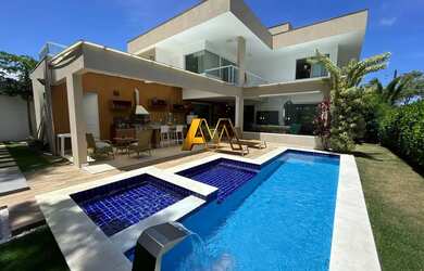 Imagem: A casa em condomínio possui 5 Dormitórios, 5 Banheiros, 4