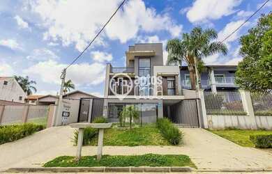 Imagem: A casa possui 3 Dormitórios, 5 Banheiros, 1 Vaga na garagem