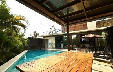 Imagem: A casa em condomínio à venda possui 4 Dormitórios, 5 Banheiros