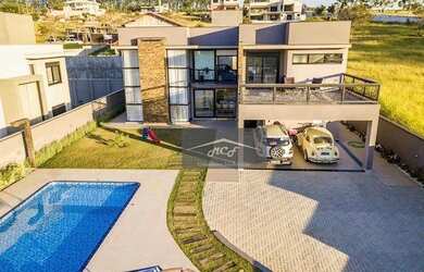 Imagem: A casa em condomínio possui 3 Dormitórios, 4 Banheiros, 4