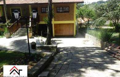 Imagem: A casa em condomínio possui 4 Dormitórios, 3 Banheiros, 5