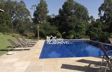 Imagem: A casa em condomínio possui 5 Dormitórios, 5 Banheiros, 5