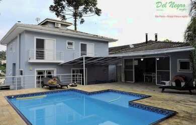 Imagem: A casa em condomínio possui 4 Dormitórios, 5 Banheiros, 5