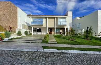 Imagem: A casa em condomínio possui 4 Dormitórios, 4 Banheiros, 2