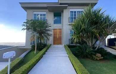 Imagem: A casa possui 5 Dormitórios, 5 Banheiros, 5 Vagas na garagem