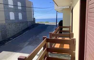 Imagem: A casa possui 4 Dormitórios, 3 Vagas na garagem e está localizado