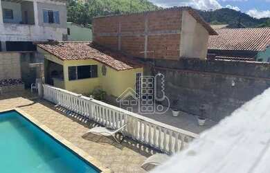 Imagem: A casa possui 4 Dormitórios, 4 Banheiros, 4 Vagas na garagem