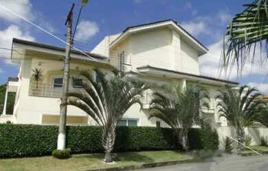 Imagem: A casa em condomínio possui 4 Dormitórios, 5 Banheiros, 5