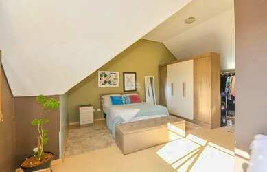 Imagem: A casa possui 2 Dormitórios, 4 Banheiros, 2 Vagas na garagem