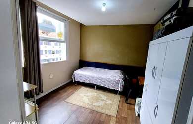 Imagem: Aluguel de quarto individual com vista para a praia, rua do