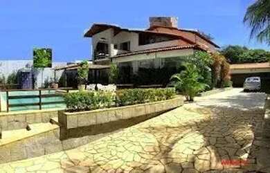 Imagem: A casa possui 4 Dormitórios, 5 Banheiros, 5 Vagas na garagem