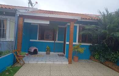 Imagem: A casa possui 2 Dormitórios, 2 Banheiros, 1 Vaga na garagem