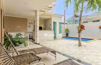 Imagem: A casa em condomínio possui 5 Dormitórios, 5 Banheiros, 3