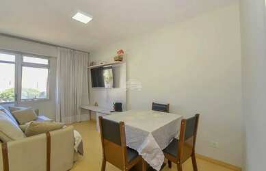 Imagem: O apartamento possui 1 Dormitório, 1 Banheiro, 1 Vaga na garagem