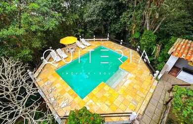 Imagem: A casa em condomínio possui 4 Dormitórios, 4 Banheiros, 4