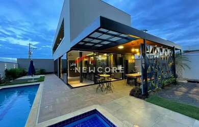 Imagem: A casa possui 4 Dormitórios, 5 Banheiros, 4 Vagas na garagem