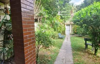 Imagem: A casa possui 5 Dormitórios, 4 Banheiros, 2 Vagas na garagem