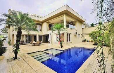 Imagem: A casa em condomínio possui 4 Dormitórios, 5 Banheiros, 5