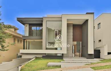 Imagem: A casa em condomínio possui 4 Dormitórios, 5 Banheiros, 5