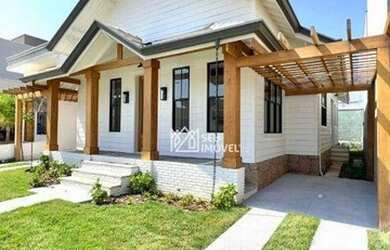 Imagem: A casa em condomínio possui 2 Dormitórios, 3 Banheiros, 180m²