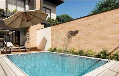 Imagem: A casa possui 3 Dormitórios, 4 Banheiros, 2 Vagas na garagem