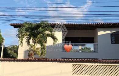 Imagem: A casa possui 4 Dormitórios, 2 Banheiros, 3 Vagas na garagem