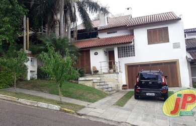 Imagem: A casa em condomínio possui 3 Dormitórios, 3 Banheiros, 4