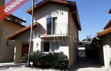 Imagem: A casa em condomínio possui 2 Dormitórios, 4 Banheiros, 2