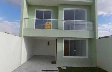 Imagem: A casa possui 3 Dormitórios, 1 Banheiro, 2 Vagas na garagem